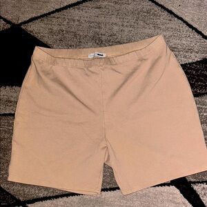 Tan biker shorts from Fashion Nova. 
Size large im 5,9 and there finger length.